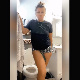 A pretty girl speaks in a demeaning way to the camera before standing over a toilet while taking a soft, messy shit that somewhat misses the bowl. Audio is slightly out of sync. Vertical HD format video. About 2 minutes.